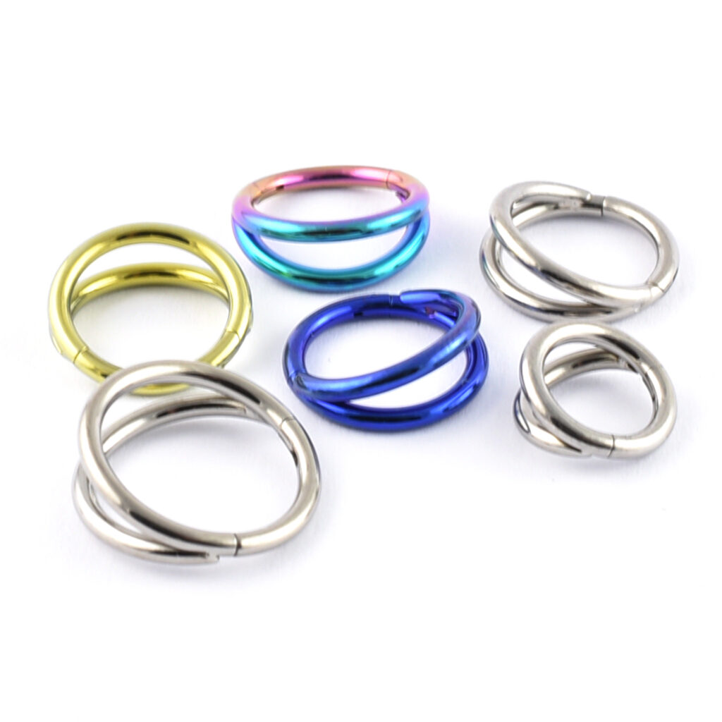 Titanium double band segment ring