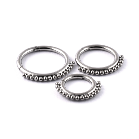 Titanium segment ring with tiny multi balls