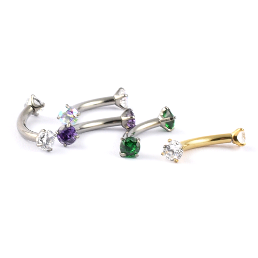 Titanium curved bar with claw-set gems