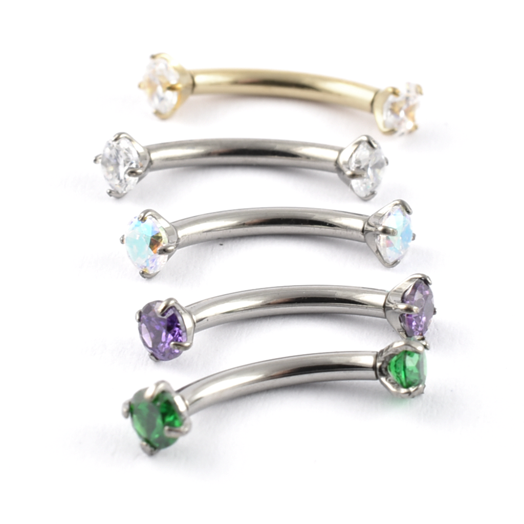 Titanium curved bar with claw-set gems
