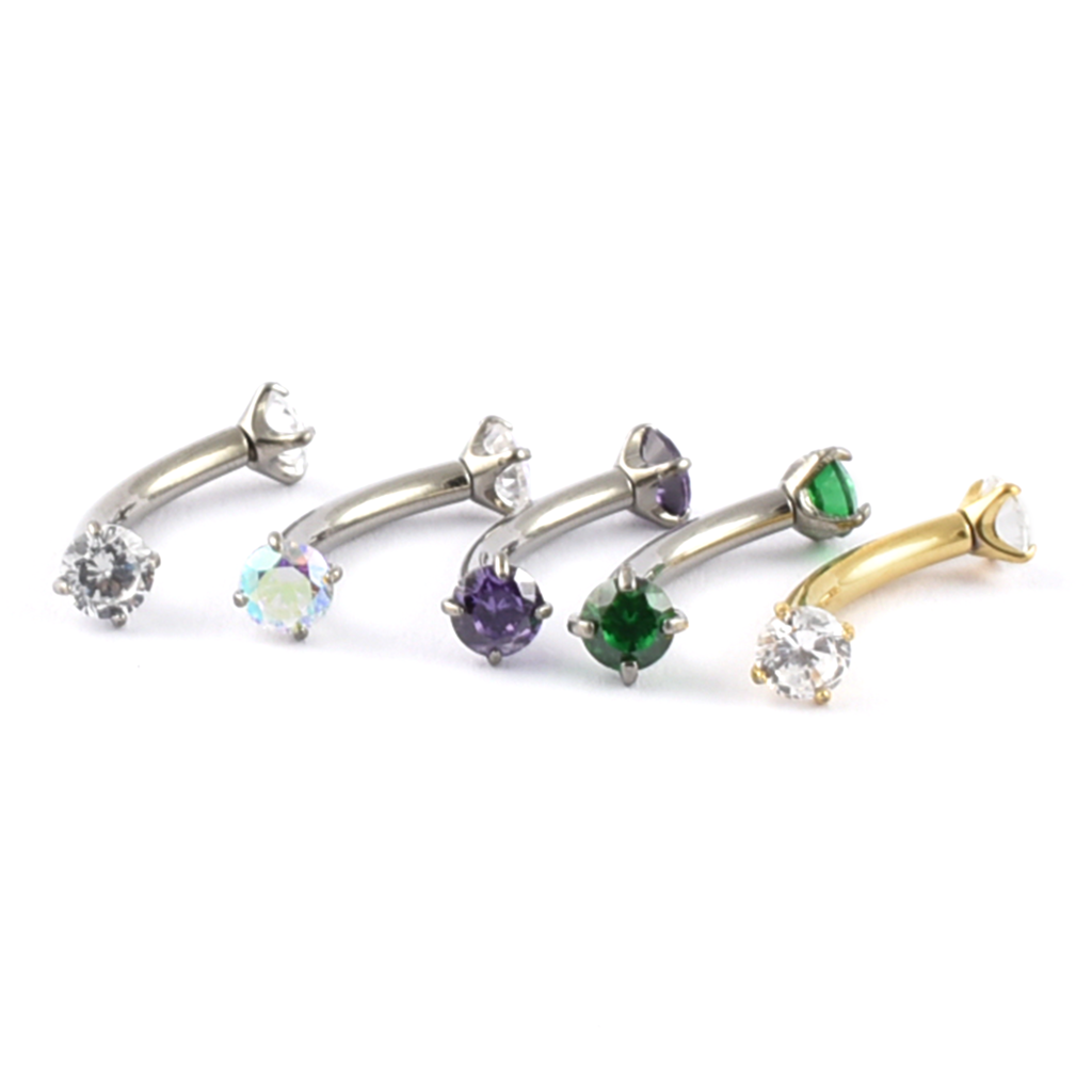 Titanium curved bar with claw-set gems